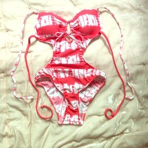 A pink and white swimming suit